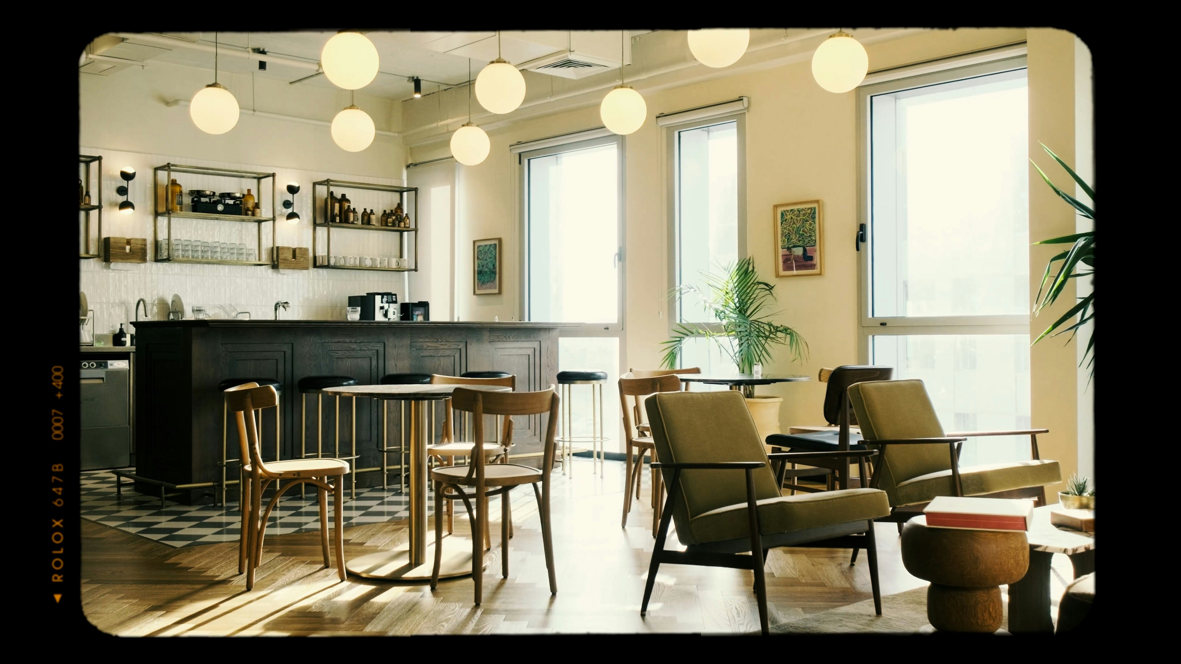 A warm cozy cafe interior with chairs and tables